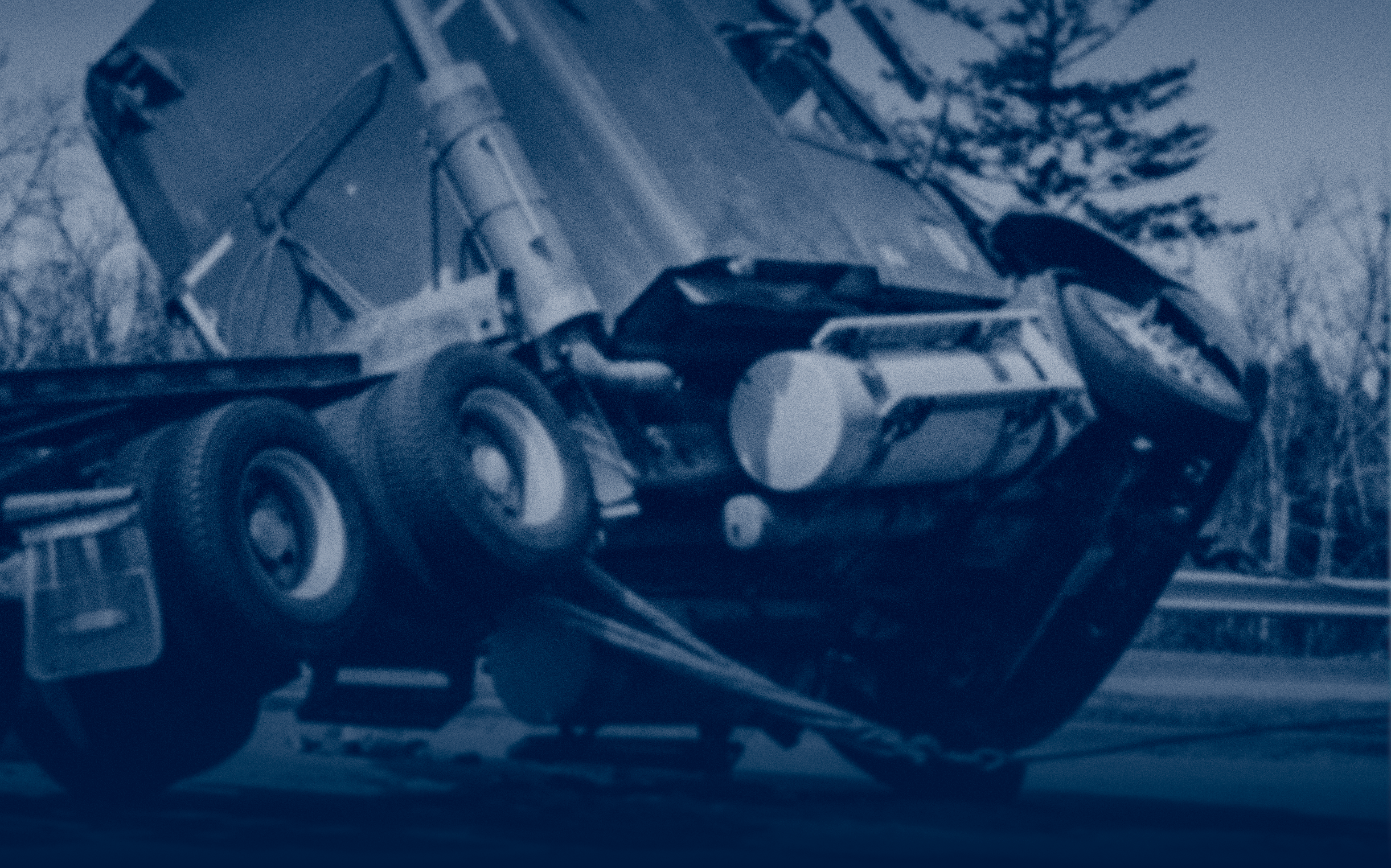 Overturned semi-truck on the side of the road after a collision, illustrating the severity and impact of a Truck Accident Settlement Take in Oklahoma.
